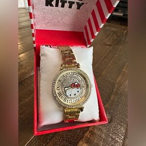 HELLO KITTY gold watch with faux diamond details
